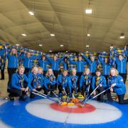 A squad of 20 women curlers from across Scotland who are in Sweden to raise money for a charity launched by the late rugby legend Doddie Weir.