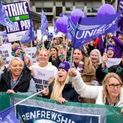 School support staff members of Unison during a rally outside the Scottish parliament in Holyrood, Edinburgh