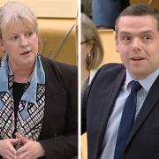 Shona Robison and Douglas Ross clashed over NHS funding at FMQs