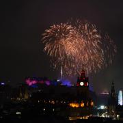 Thousands of revellers are expected to gather in Edinburgh to mark the 30th anniversary of the city’s street party and concert celebration (Andrew Milligan/PA)