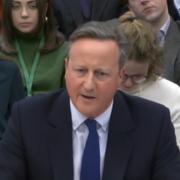 Foreign Secretary David Cameron giving evidence at a Westminster select committee