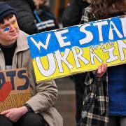 Protesters demonstrating against Vladimir Putin's invasion of Ukraine