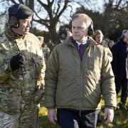 Secretary of State for Defence Grant Shapps, speaks to General Patrick Sanders during a visit to a military training camp in East Anglia