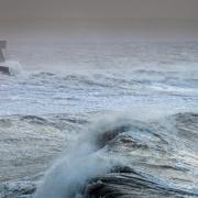 The Met Office has warned of a 'small chance of a danger to life' from large waves
