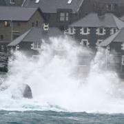 Waves crash off the rocks in Lerwick, Shetland