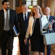 Deputy First Minister Shona Robison alongside First Minister Humza Yousaf as they make their way to the chamber
