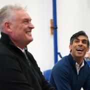Lee Anderson laughs alongside Rishi Sunak during a previous campaigning visit. He has now lost the Tory whip