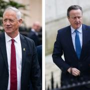 Foreign Secretary Lord David Cameron (right) met with Israeli War Cabinet Minister Benny Gantz