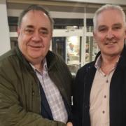 Alex Salmond shakes hands with new Alba councillor Karl Rosie