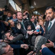 Humza Yousaf speaks to the media after being voted in as the 6th First Minster of Scotland at the Scottish Parliament in Holyrood, Edinburgh.