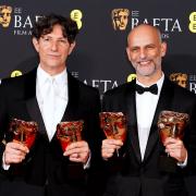 Jonathan Glazer and James Wilson in the press room after winning the Best film not in the English language award