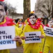 Demonstrators dressed as chickens protest opposite Downing Street in London as Labour is calling on Rishi Sunak to name the General Election date