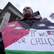 People taking part in a Honour the Children of Gaza demonstration