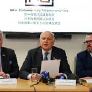Stewart McDonald at a press conference on Chinese cyber-attacks with Iain Duncan Smith, centre and Tim Loughton, left