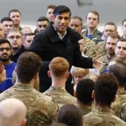 Young people would be given a choice between a full-time placement in the armed forces for 12 months or spending one weekend a month for a year 'volunteering' in their community