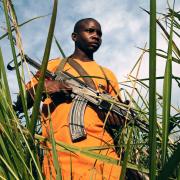 A young fighter of the FRPI militia (Patriotic Force of Resistance for Ituri) photographed in the Democratic Republic of Congo