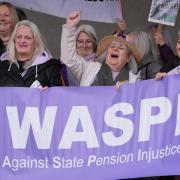 People at a Women Against State Pension Inequality (Waspi) protest outside the Scottish Parliament in Edinburgh