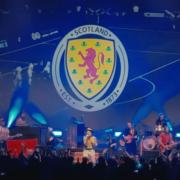 A screen from the music video for Belle and Sebastian's new Scottish football song It Only Takes One Lion