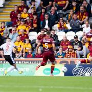 Declan John finishes off a fine St Mirren move against Motherwell, one of six goals in a stunning game of football in Paisley on Sunday.
