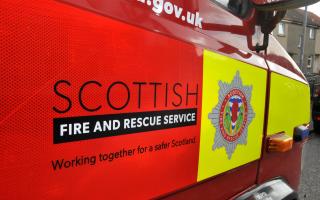 Two people are in hospital following a fire in Edinburgh