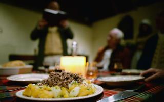 A group re-enact the first ever Burns Supper held in 1801