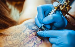 There are calls for Scotland's tattoo industry to be more heavily regulated