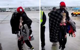 Snoop Dogg dances to the bagpipes at Glasgow Airport