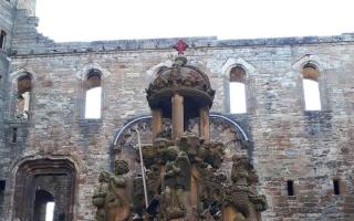 A fountain at Linlithgow Palace has been sprayed with red paint
