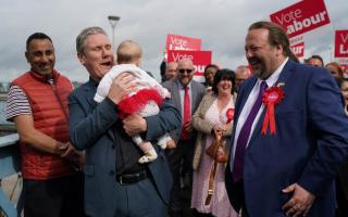 Labour leader Sir Keir Starmer holds five month old Hazel as he joins party members in Chatham, Kent, where Labour has taken overall control of Medway Council for the first time since 1998