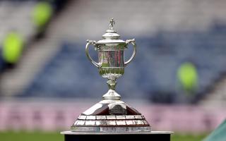 The Scottish Cup trophy on display at a semi-final match at Hampden Park