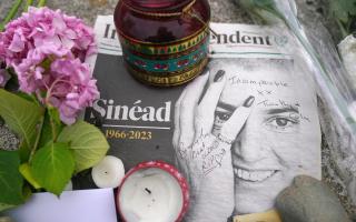 Floral tributes laid outside Sinead O'Connor's former home in Bray, Co Wicklow