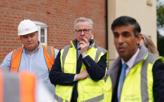 Michael Gove pictured in Norwich on Tuesday alongside Prime Minister Rishi Sunak