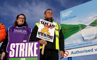Members of the Unite, Unison and GMB unions on strike at Scottish Water