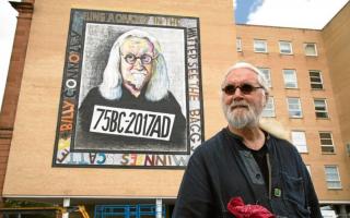 Billy Connolly visiting the mural