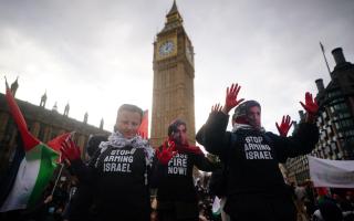 Protesters block Westminster Bridge during a Free Palestine Coalition demonstration