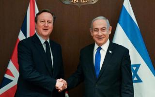 UK Foreign Secretary David Cameron shakes hands with Israeli prime minister Benjamin Netanyahu