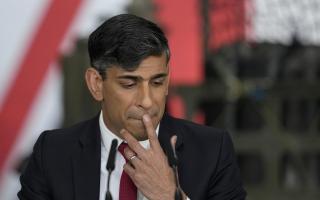 Prime Minister Rishi Sunak appearing at a press conference in Warsaw on Tuesday