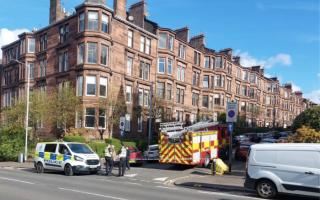 Fire crews rushed to Glasgow's west end after a blaze broke out in a tenement flat