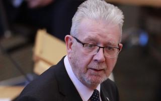 SNP president Michael Russell wants to see Scotland take the first steps to being a wellbeing nation