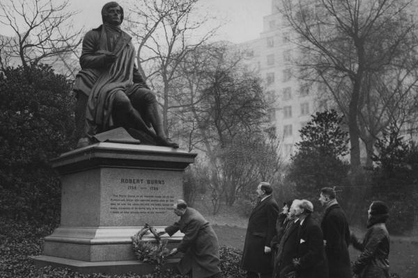 Ever popular: Burns fans at his statue in Victoria Embankment gardens in London in  1933