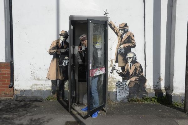 Banksy mural satirising government surveillance is removed from side of house near GCHQ