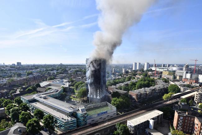 Grenfell Tower, the ‘anti-Shard’ stands both as blackened tombstone and giant reproach  Photograph: Leon Neal/Getty Images