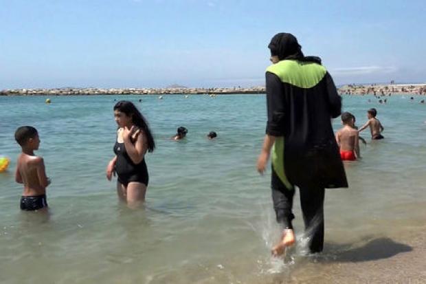 More violence has been committed by men in suits than by women in burkini. Photograph: AP