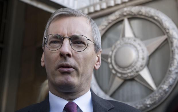 The National: British ambassador to Russia, Laurie Bristow, leaves after a meeting at the Russian foreign ministry building in Moscow, Russia, Saturday, March 17, 2018. Russia's Foreign Ministry has summoned Bristow for talks in a heightening dispute over a nerve a