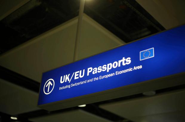 The National: UK/EU passport sign