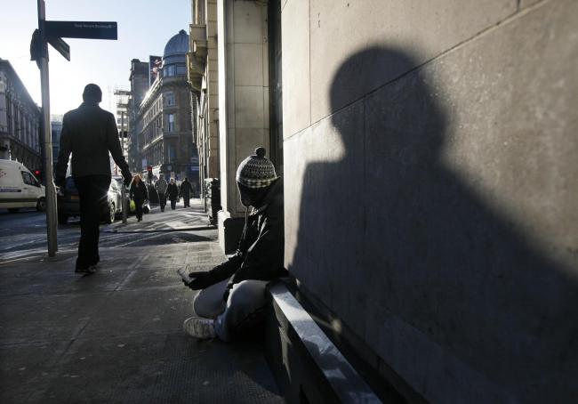 A man begging on Renfield street..... Photograph by Colin Mearns..5 December 2012.