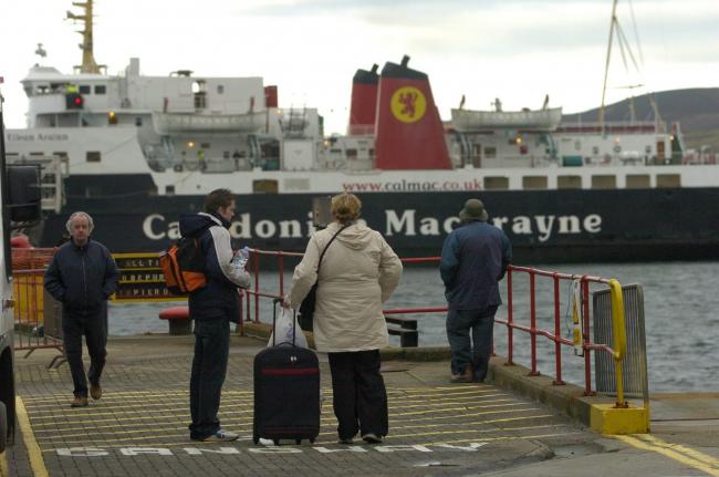 The Caledonian MacBrayne ferry 'Isle Of Arran' arriving at port Ellen on Islay. Photograph: Colin Mearns