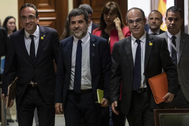 From left: Catalan politicians Josep Rull, Jordi Sanchez and Jordi Turull