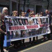 Victims and campaigners outside Central Hall in Westminster, London, after the publication of the Infected Blood Inquiry report